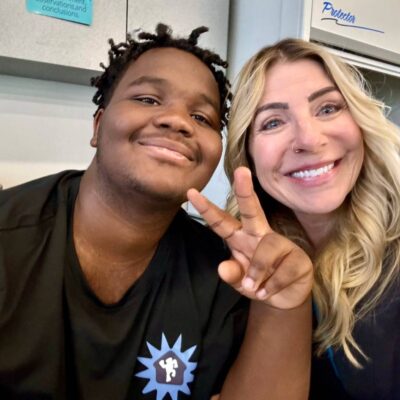 Dr. Kimberly Regan, CEO and Founder of Sierra Nevada Academy Charter School with an 8th grade SNACS student.